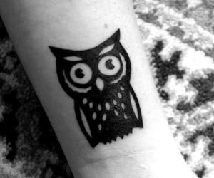 Wonderful Black Ink Owl Tattoo Design For Wrist