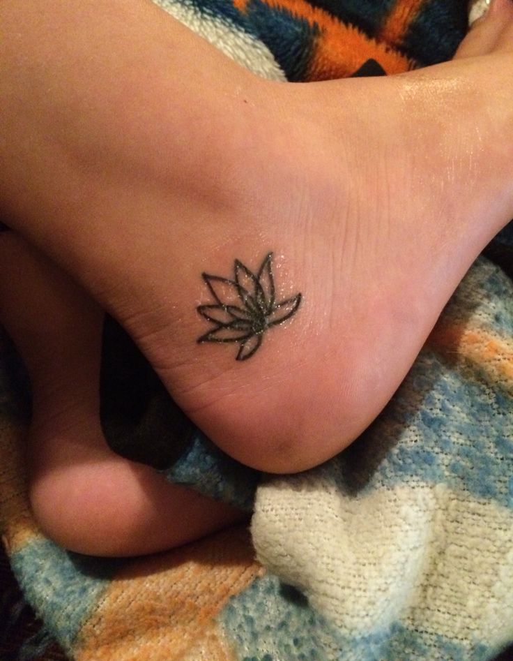 Wonderful Black Outline Lotus Tattoo On Right Ankle