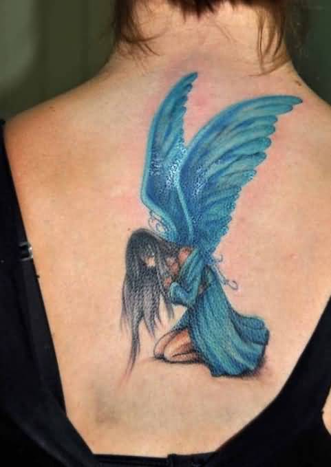 Wonderful Fairy Tattoo On Girl Upper Back