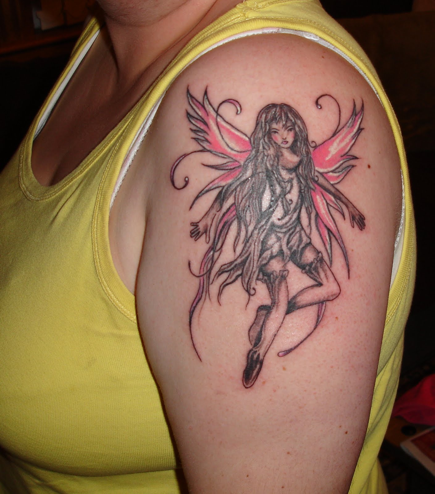 Wonderful Fairy Tattoo On Women Left Shoulder