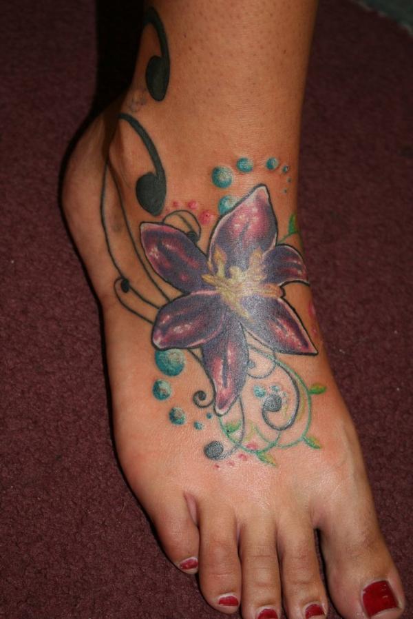 Wonderful Lily Flower Cover Up Tattoo On Girl Right Foot