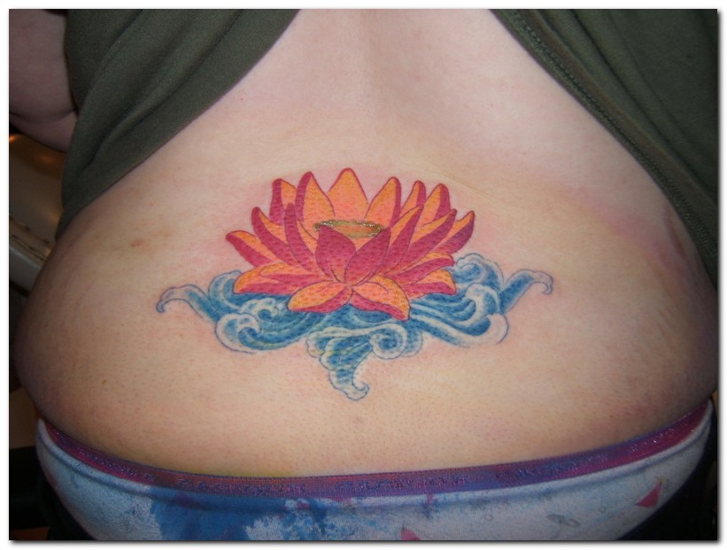 Wonderful Lotus Flower In Water Tattoo On Lower Back