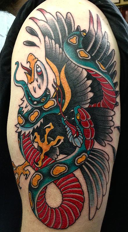 Wonderful Traditional Eagle With Snake Tattoo On Left Half Sleeve
