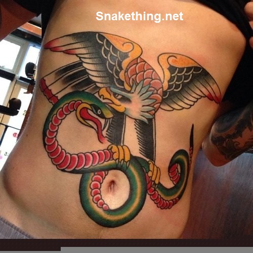 Wonderful Traditional Eagle With Snake Tattoo On Man Stomach