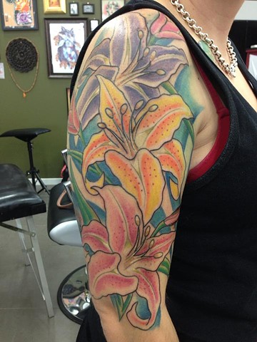 Yellow And Pink Lily Tattoos On Half Sleeve