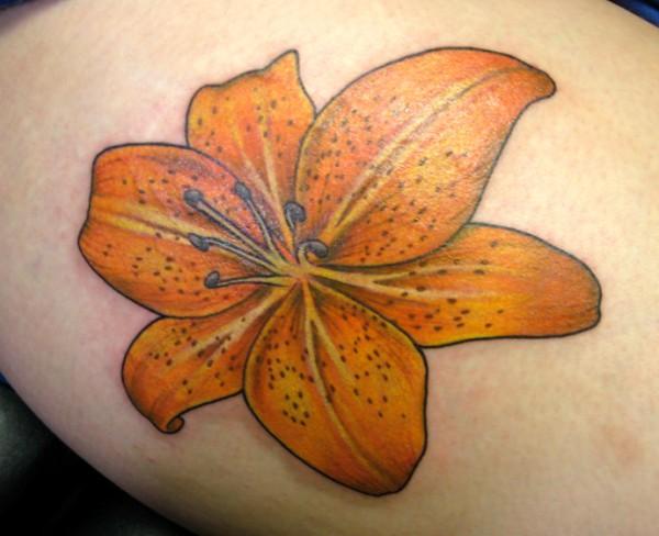 Yellow Ink Tiger Lily Tattoo