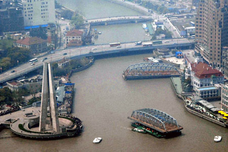 A Barge Carrying A Section Of The Waibaidu Bridge Sails Toward The Huangpu River In Shanghai