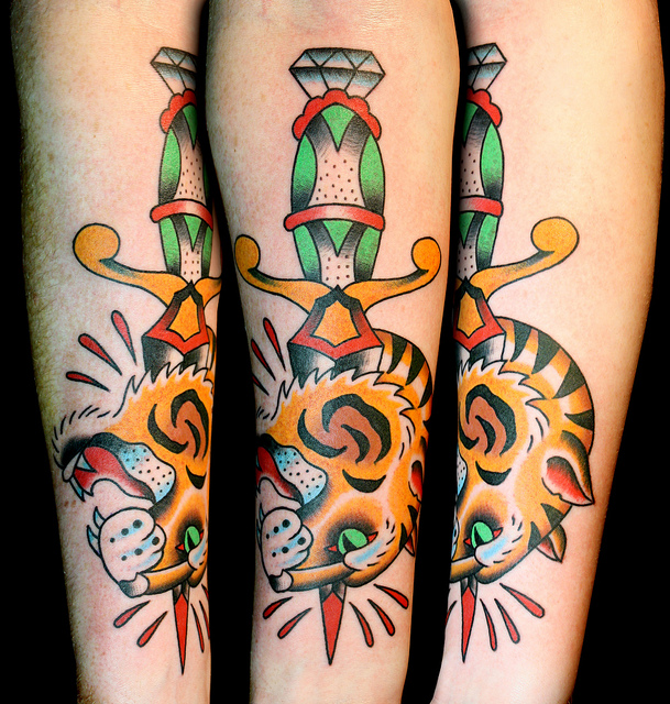 Amazing Color Ink Dagger Tiger Tattoo On Arm Sleeve