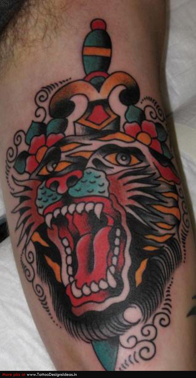 Amazing Colored Dagger And Tiger Tattoo On Bicep