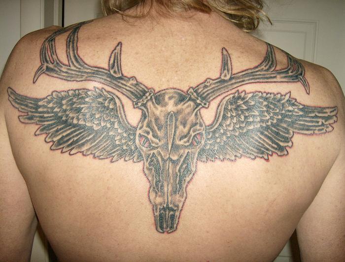 Angel Winged Deer Skull Antler Tattoo On Upper Back