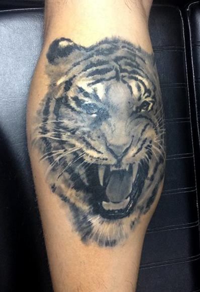 Angry Black And Grey Tiger Tattoo