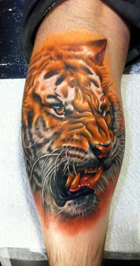 Angry Tiger Face Tattoo On Leg