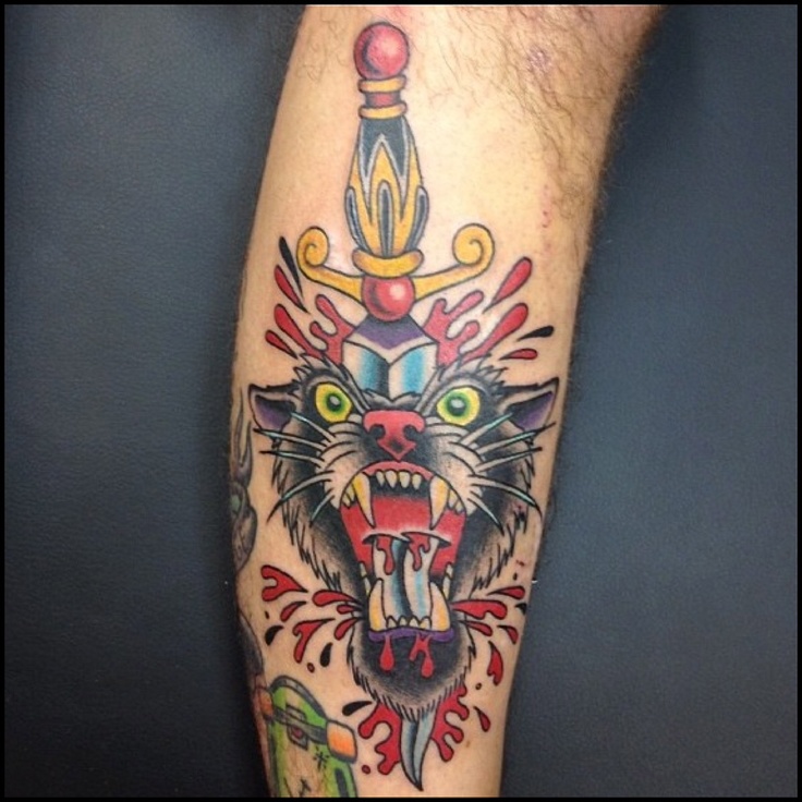 Angry Tiger With Dagger In Head Tattoo On Leg