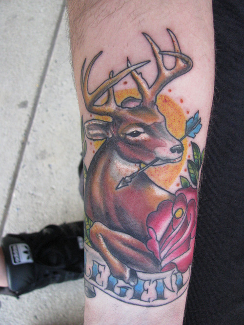 Arrow In Deer Mouth Tattoo On Sleeve