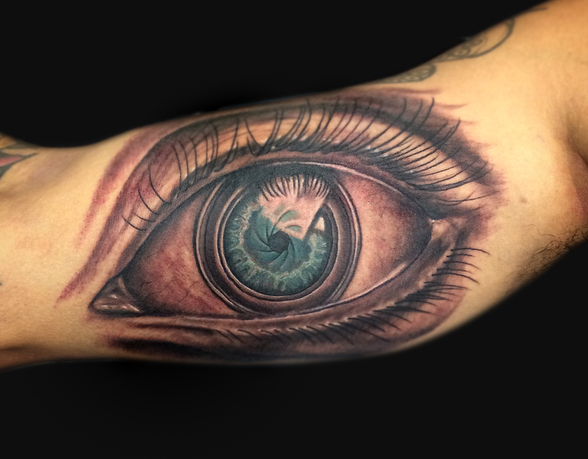 Attractive Eye Tattoo On Right Bicep By Spencer Caligiuri