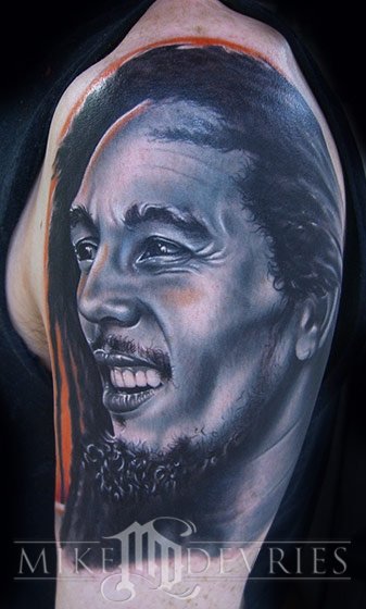 Awesome 3D Bob Marley Face Tattoo On Left Half Sleeve By Mike Devries