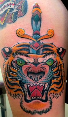 Awesome Color Ink Dagger Tiger Head Tattoo