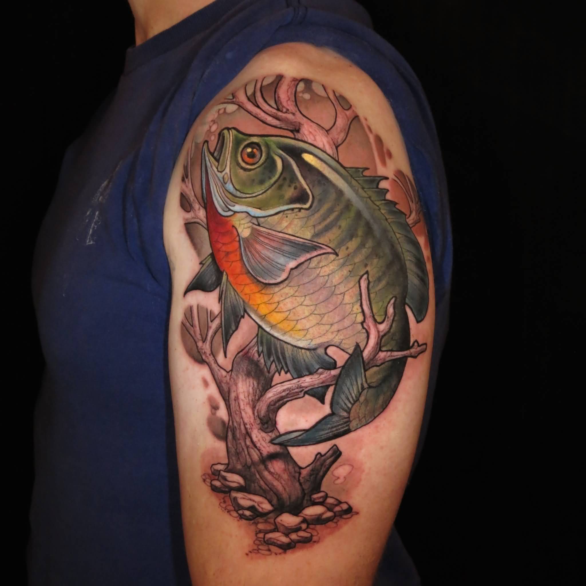 Awesome Colorful Fish Tattoo On Man Left Half Sleeve