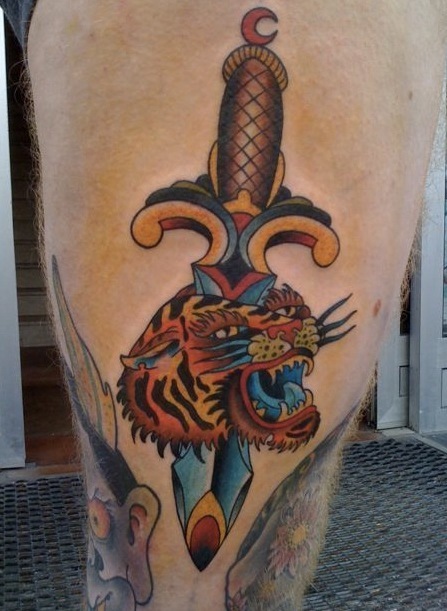 Awesome Dagger And Tiger Head Tattoo