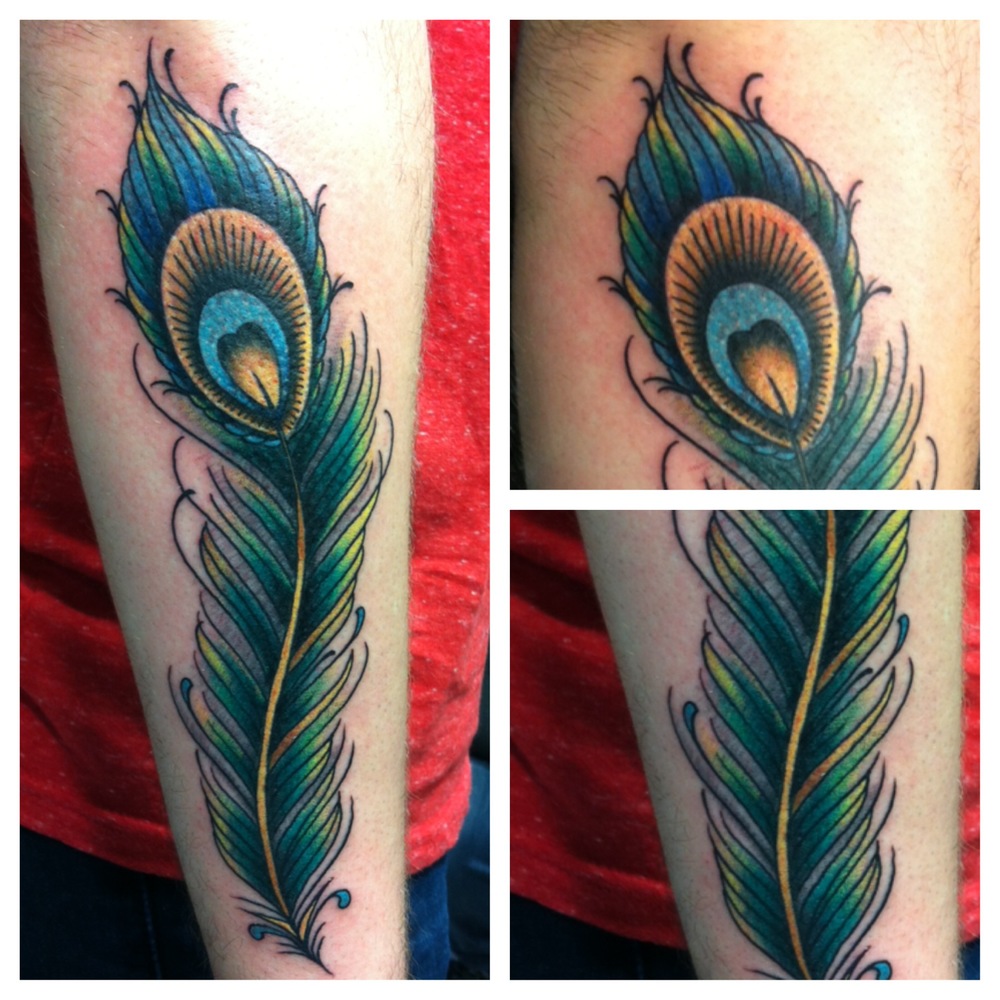 Awesome Peacock Feather Tattoo On Right Arm By Justin Brooks
