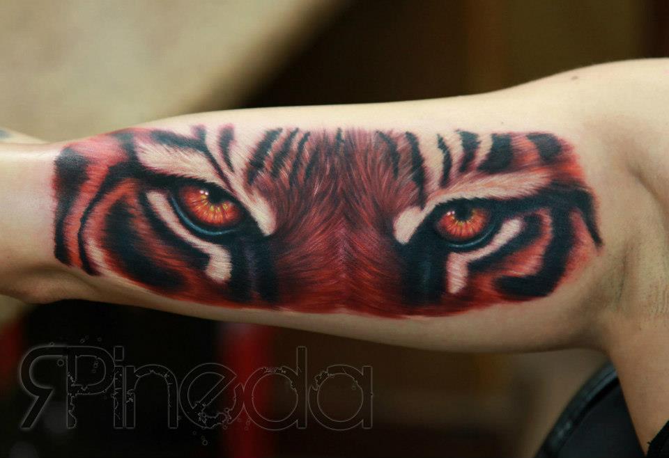 Awesome Tiger Eyes Tattoo On Bicep