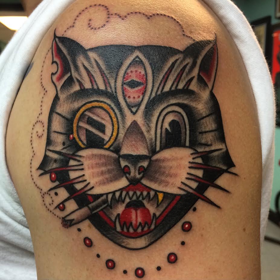Awesome Traditional Third Eye Cat Tattoo On Left Shoulder By Justin Brooks