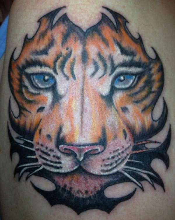 Awesome Tribal Tiger Eyes Tattoo