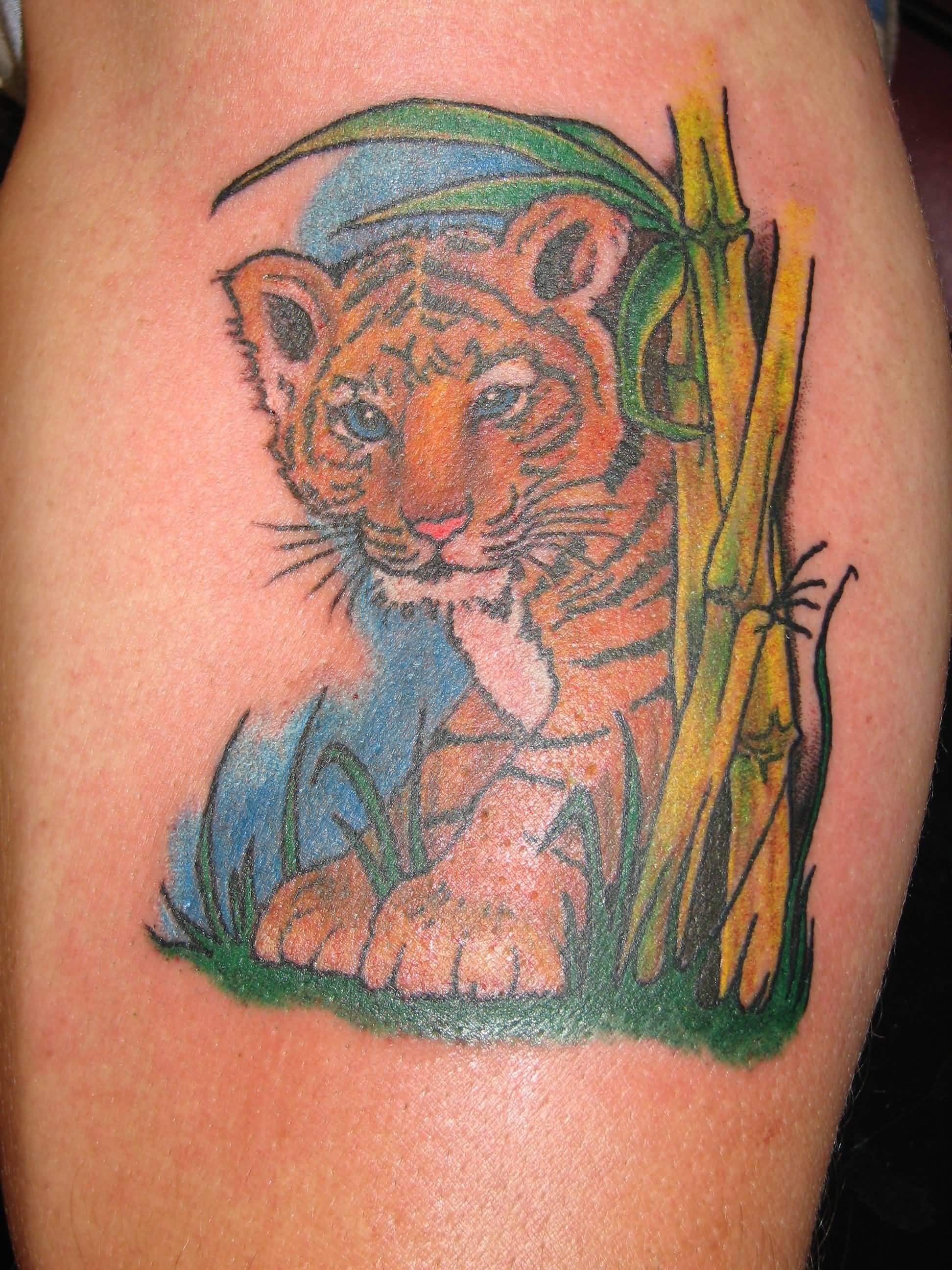 Bamboo Trees And Baby Tiger Tattoo On Side Leg