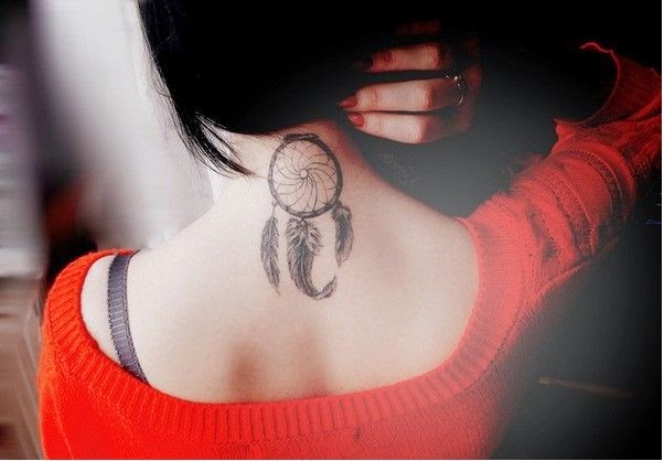 Beautiful Girl With Simple Dreamcatcher Tattoo On Nape