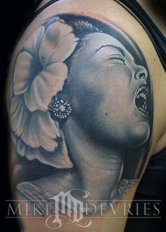 Black And Grey Girl Face With Flower Tattoo On Right Shoulder By Mike Devries