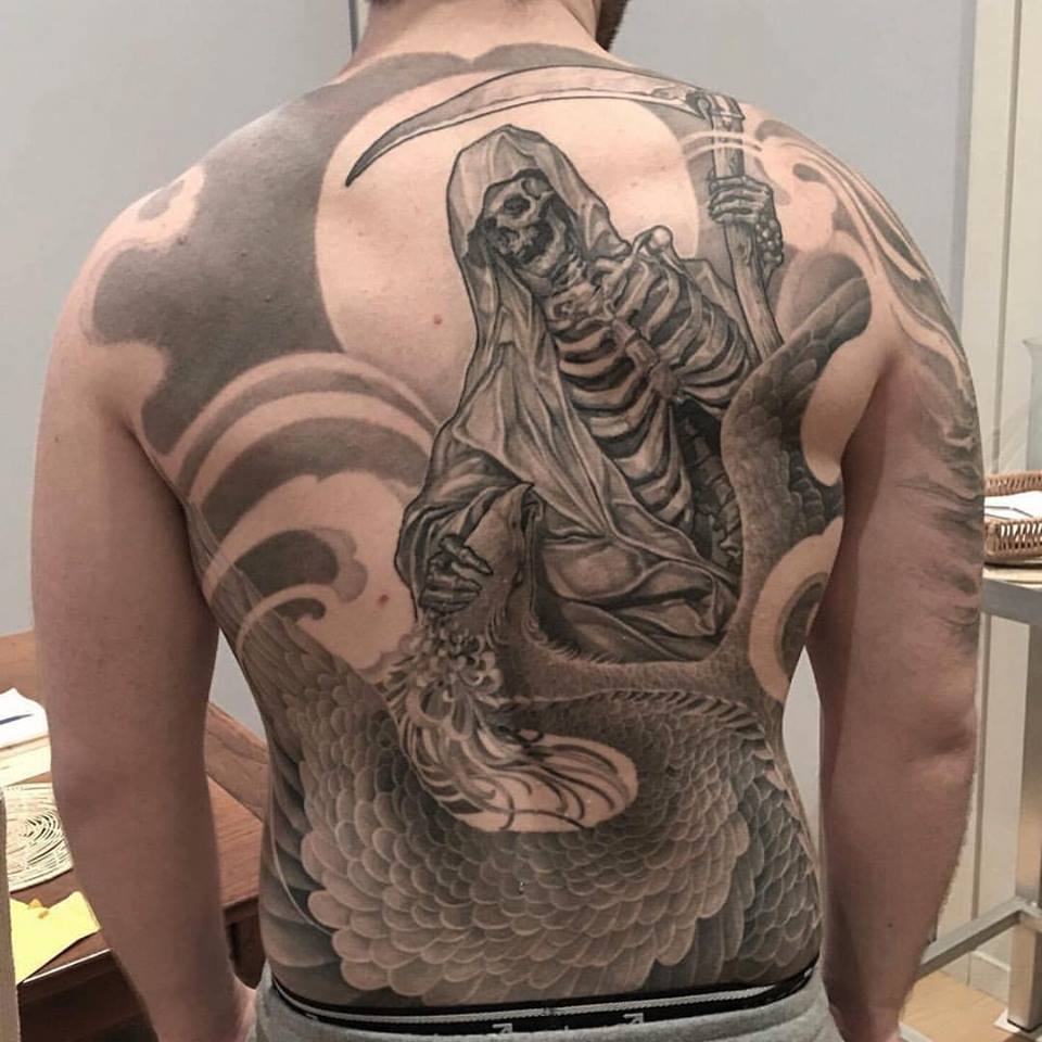 Black And Grey Grim Reaper With Phoenix Tattoo On Man Full Back