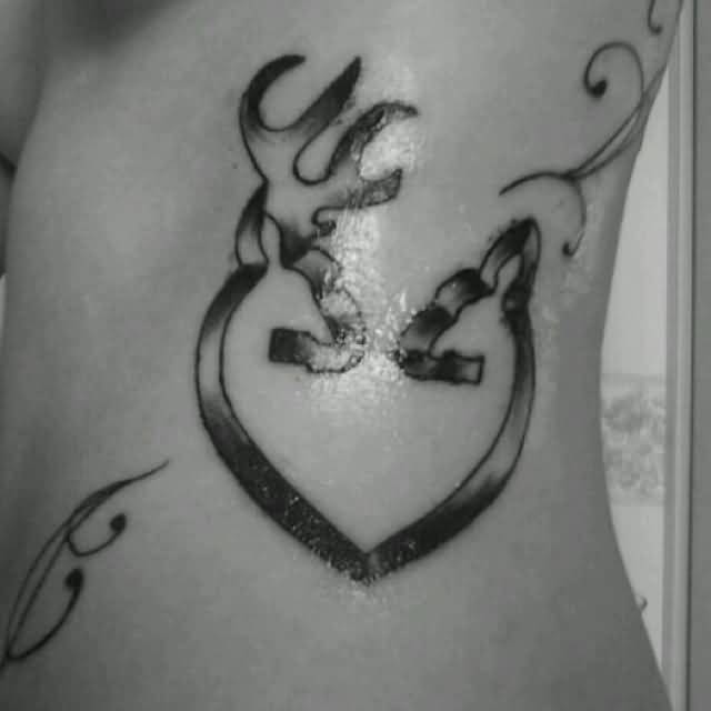 Black And Grey Ink Browning Deer Tattoo On Side Rib