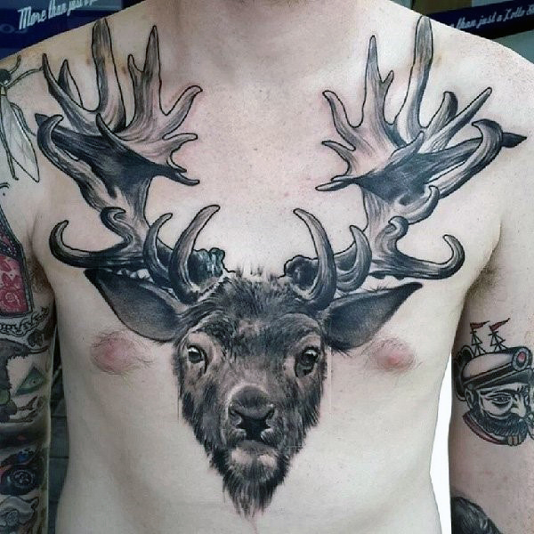 Black And Grey Ink Deer Antler Tattoo On Chest