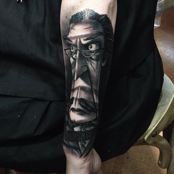 Black And Grey Man Portrait Tattoo On Left Arm