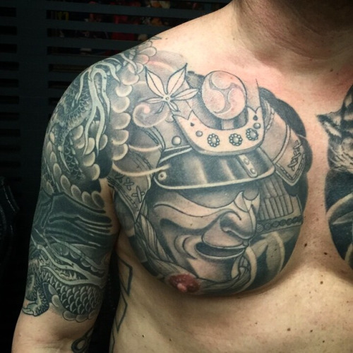 Black And Grey Samurai Head Tattoo On Right Chest