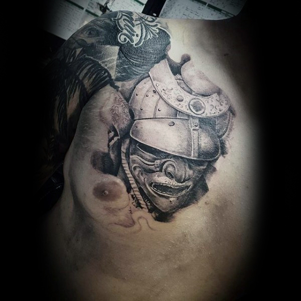 Black And Grey Samurai Mask Tattoo On Man Right Chest