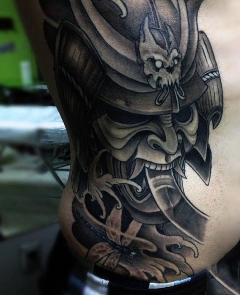 Black And Grey Samurai Mask Tattoo On Man Right Side Rib