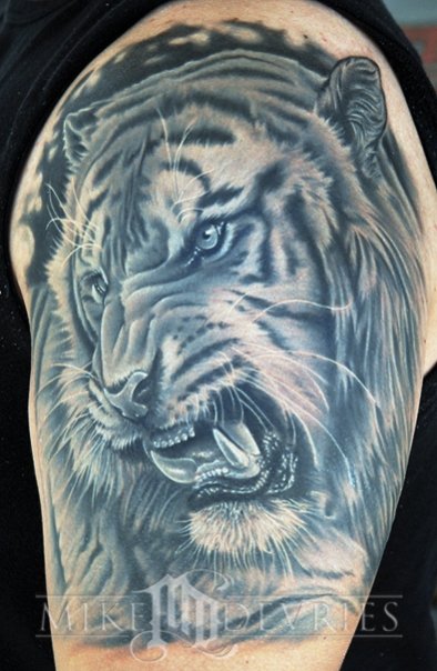 Black And Grey Tiger Tattoo On Man Left Half Sleeve By Mike Devries