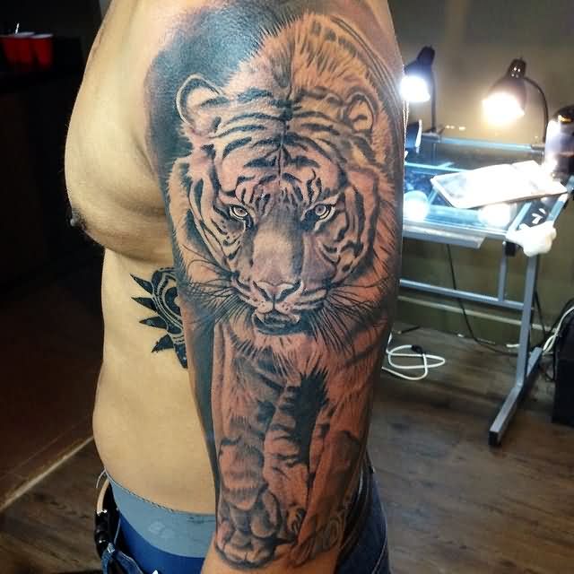 Black And Grey Tiger Tattoo On Man Left Sleeve