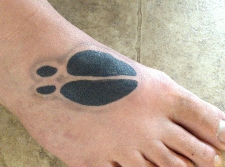 Black Deer Track Tattoo On Right Foot