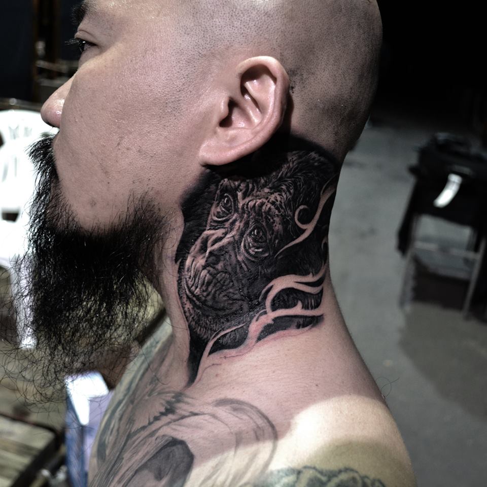 Black Ink Chimpanzee Head Tattoo On Man Left Side Neck