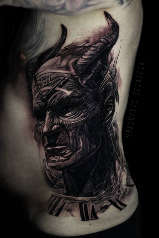 Black Ink Devil Head Tattoo On Man Left Side Rib