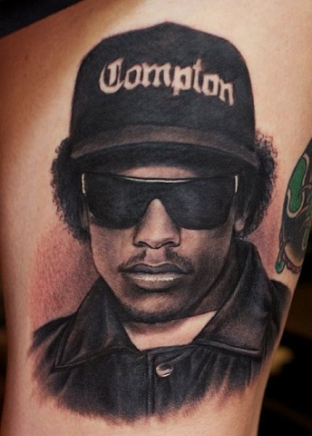 Black Ink Eazy E Portrait Tattoo Design For Men By Mick Squires