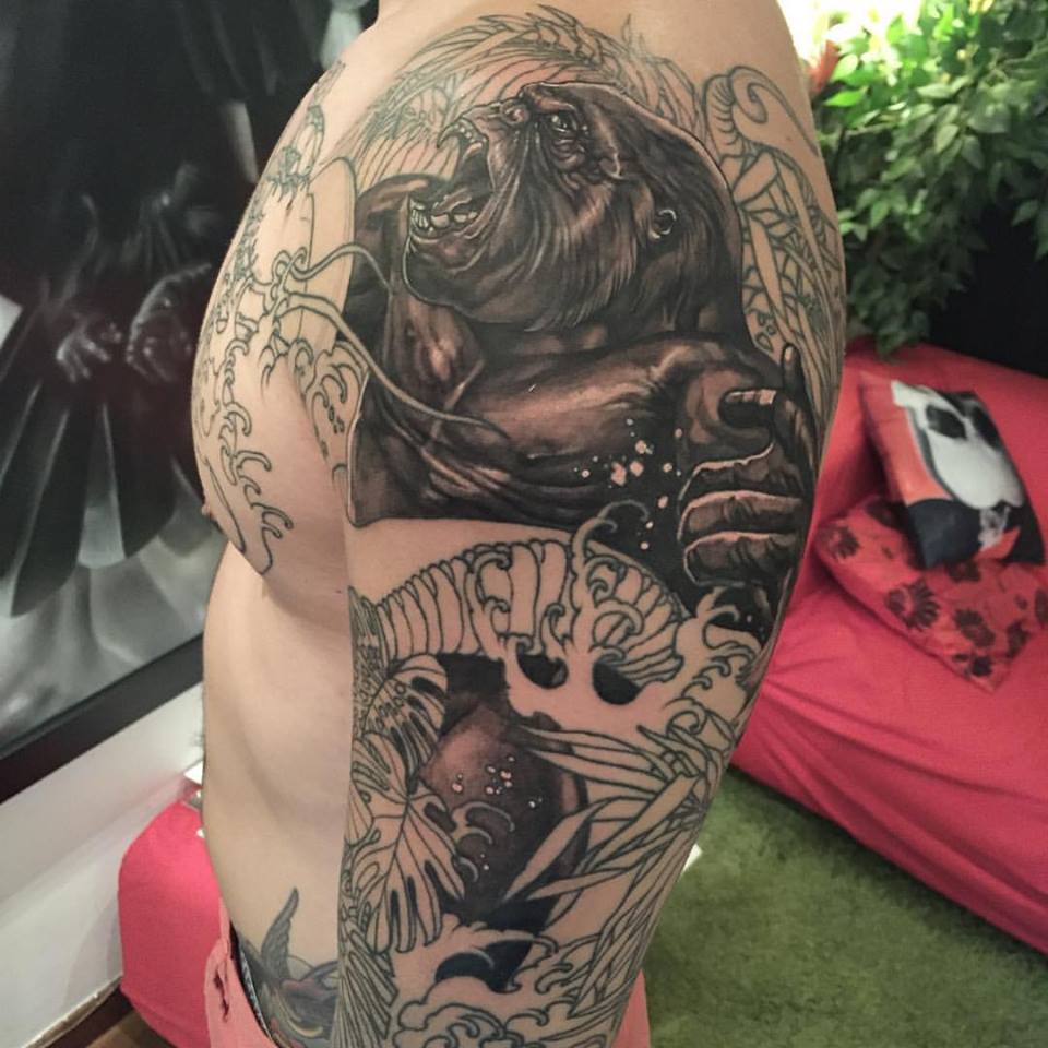 Black Ink Gorilla With Snake Tattoo On Man Left Half Sleeve By Elvin