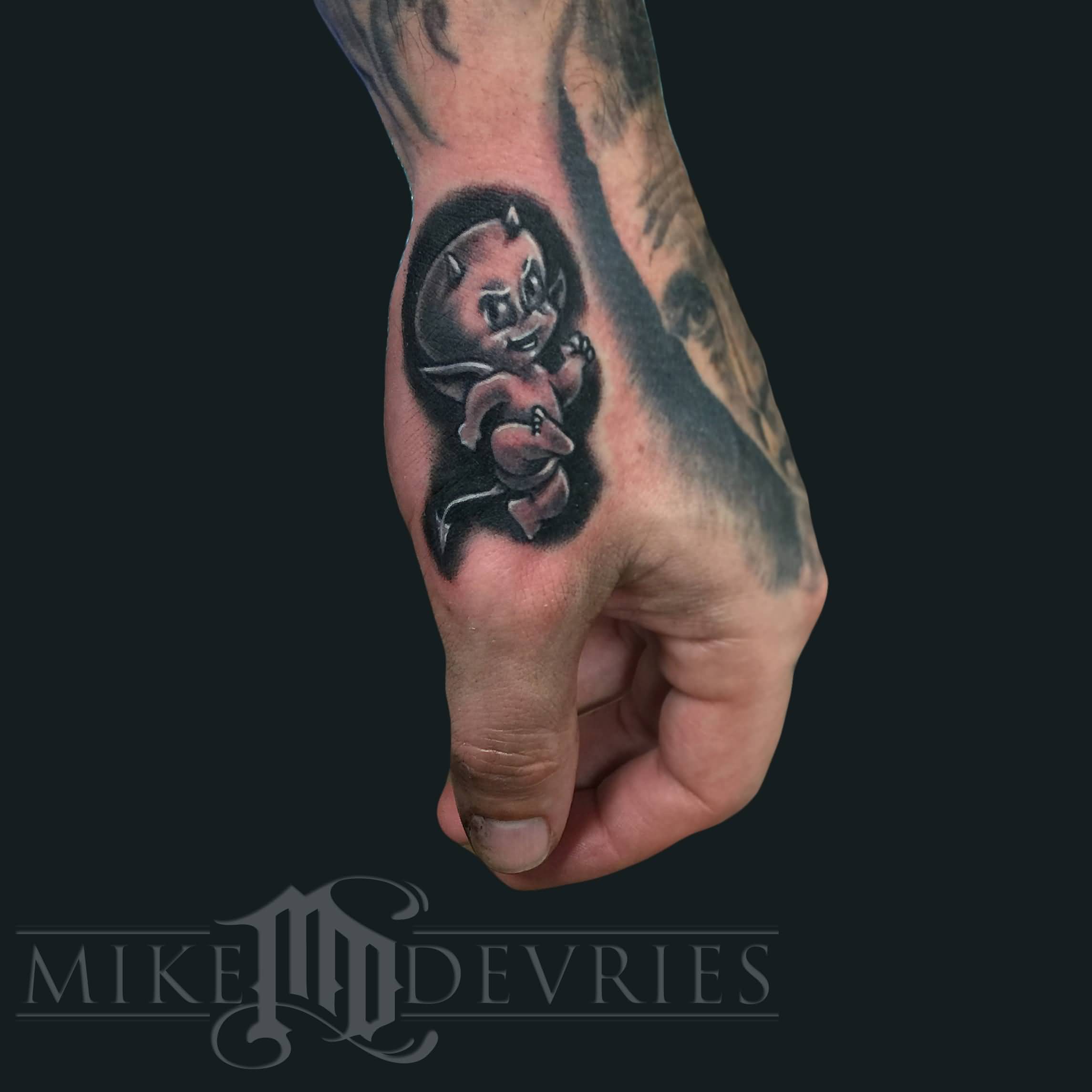 Black Ink Hot Stuff Devil Tattoo on Left Hand By Mike Devries