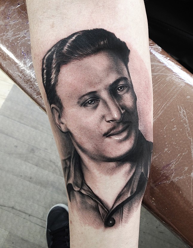 Black Ink Man Portrait Tattoo On Leg Calf By Mick Squires