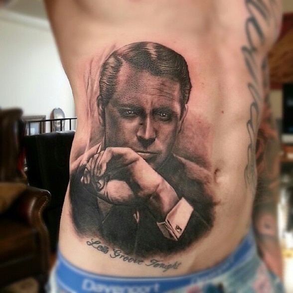 Black Ink Man Portrait Tattoo On Man Right Side Rib By Mick Squires