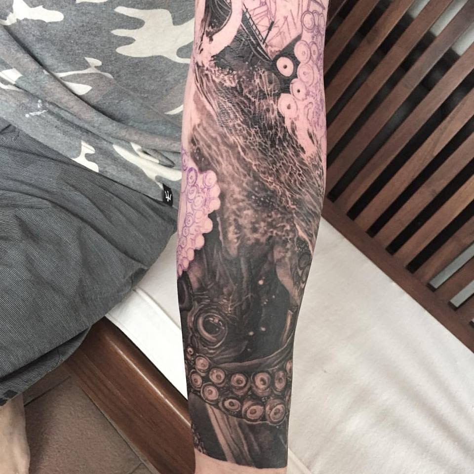 Black And Grey Octopus Tattoo On Left Forearm