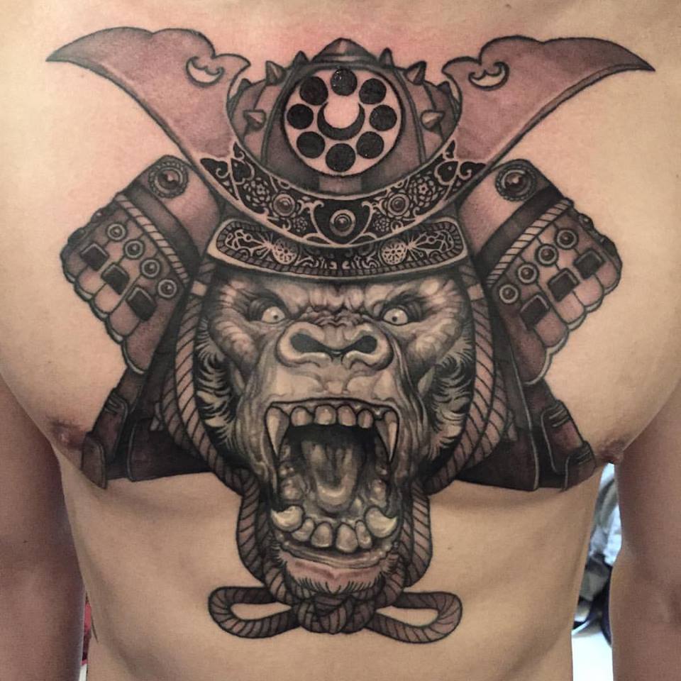 Black Ink Roaring Samurai Monkey Head Tattoo On Man Chest