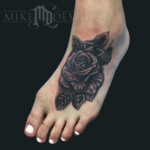 Black Ink Rose Tattoo On Girl Left Foot By Mike Devries